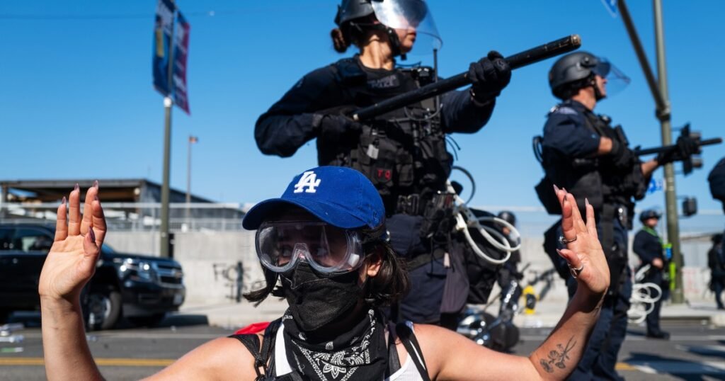 Arrests from clashes mount as Trump orders National Guard to monitor protests