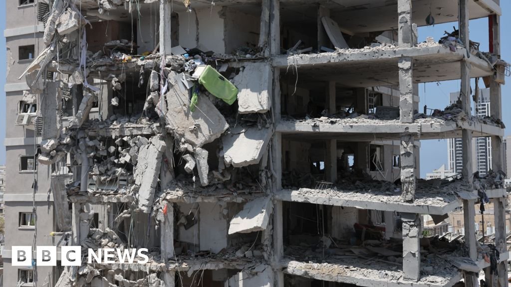 At least 10 killed in Israel and 128 in Iran after strikes, authorities say