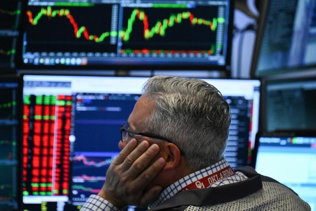 Dow, S&P 500, Nasdaq steady as Fed holds rates steady, forecasts 2 cuts in 2025