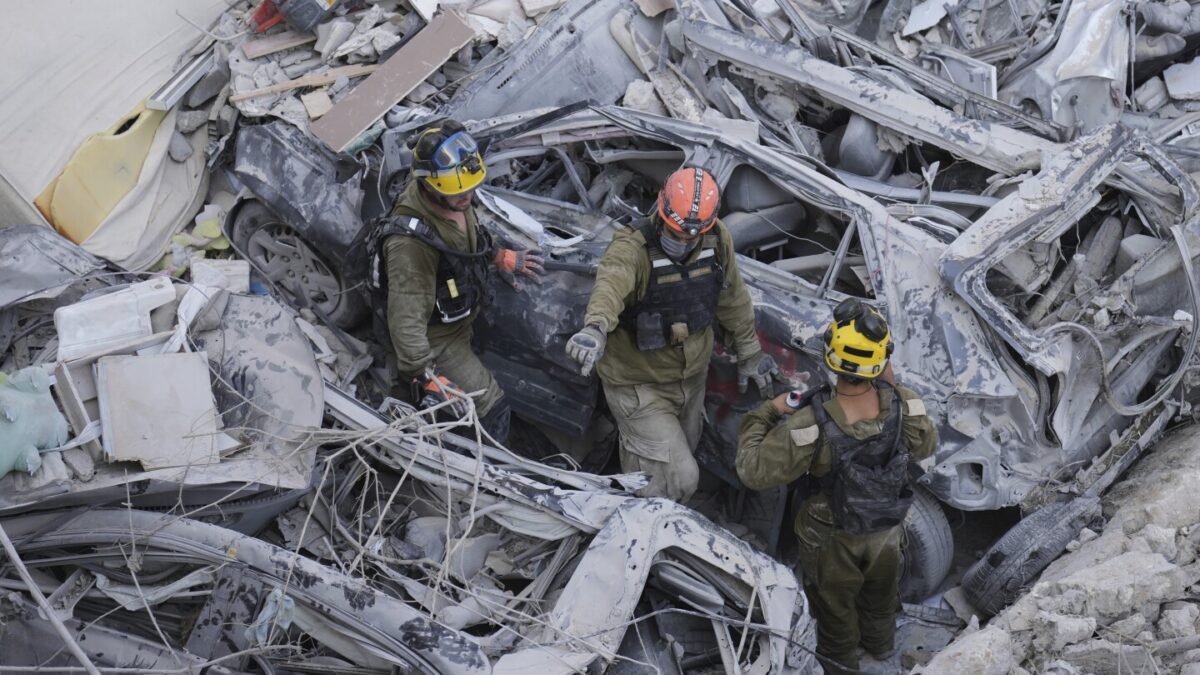 The Latest: Death toll grows as Israel and Iran trade attacks for third day