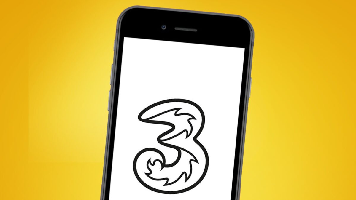 A phone on an orange background showing the Three mobile logo
