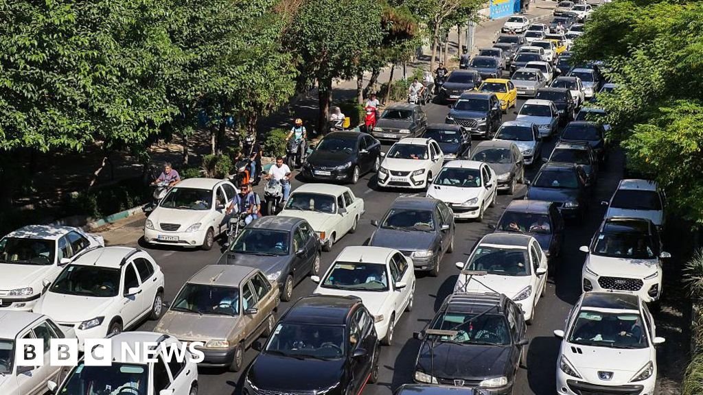 Trump's order to leave Tehran adds to fear as Iranians share 'last photo of home'