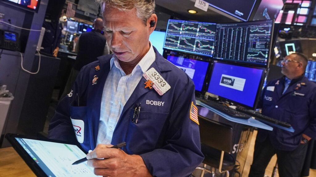 Markets shrug off new US tariff pressure in mixed trading