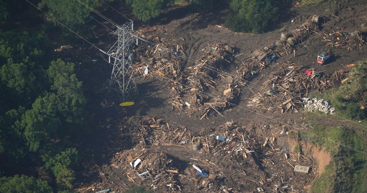 Texas flood rescue teams continue to search for scores of missing people as death toll climbs