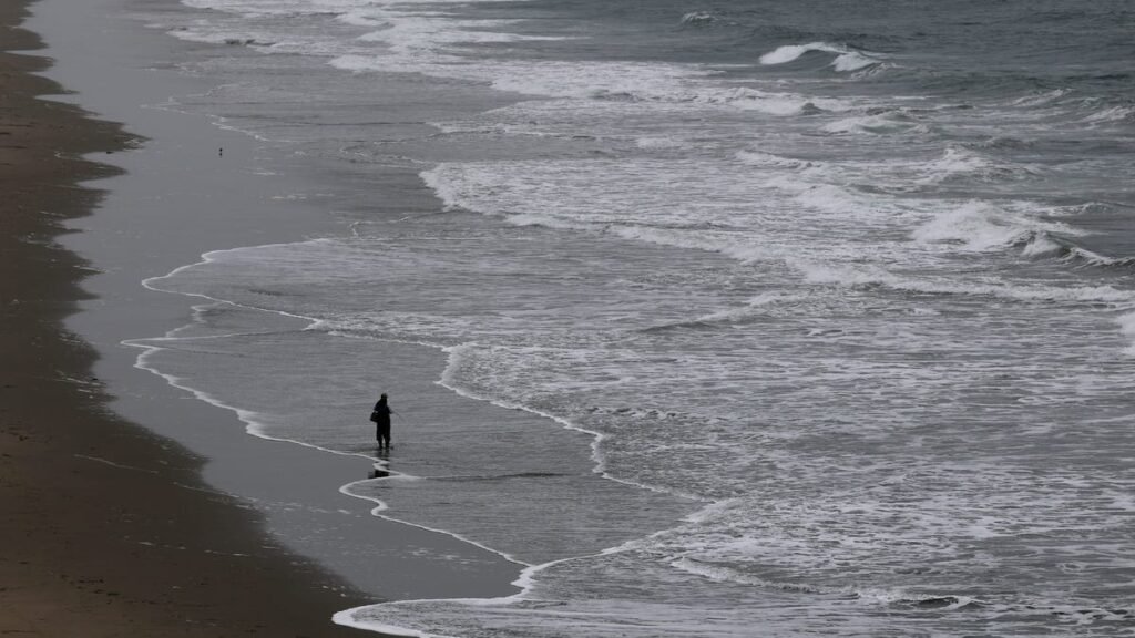 Tsunami evacuation orders lifted in Hawaii, threat to West Coast eases