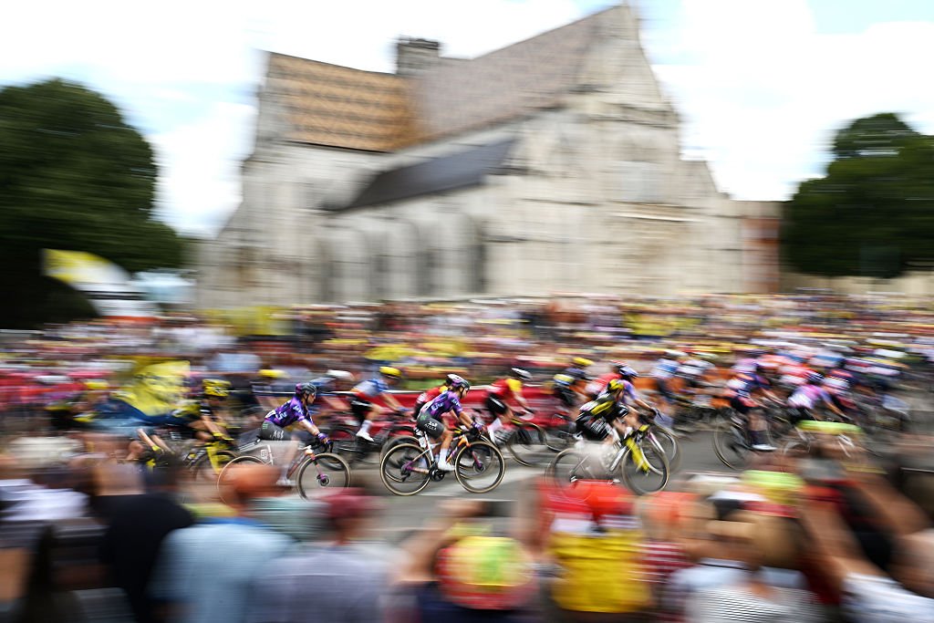 A general view of the peloton with the Brou Monastery in the background prior to the 4th Tour de France Femmes 2025, Stage 7 a 159.7km stage from Bourg-en-Bresse to Chambery / #UCIWWT / on August 01, 2025 in Bourg-en-Bresse, France. (Photo by Szymon Gruchalski/Getty