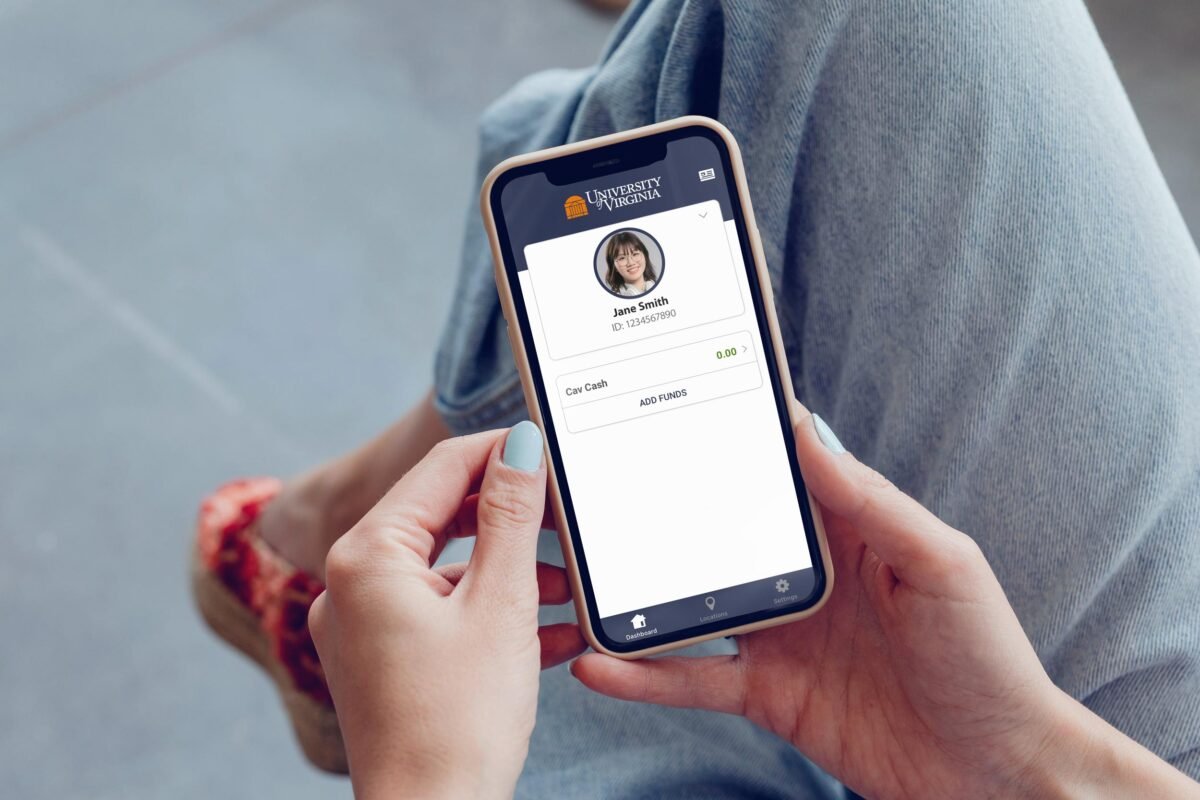 hands holding a mobile device with the new UVA mobile ID app on the screen