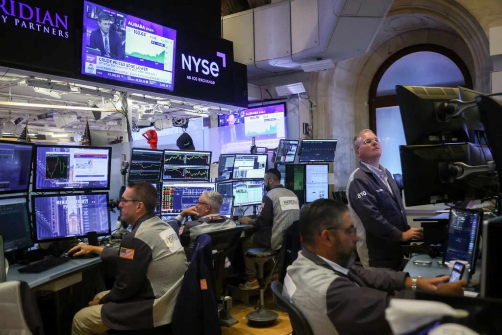 Stocks End Mixed After Federal Reserve Cuts Interest Rates; Dow Rises, Nasdaq, S&P 500 Slip